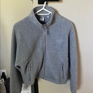 TNA polar fleece hi hip zip up